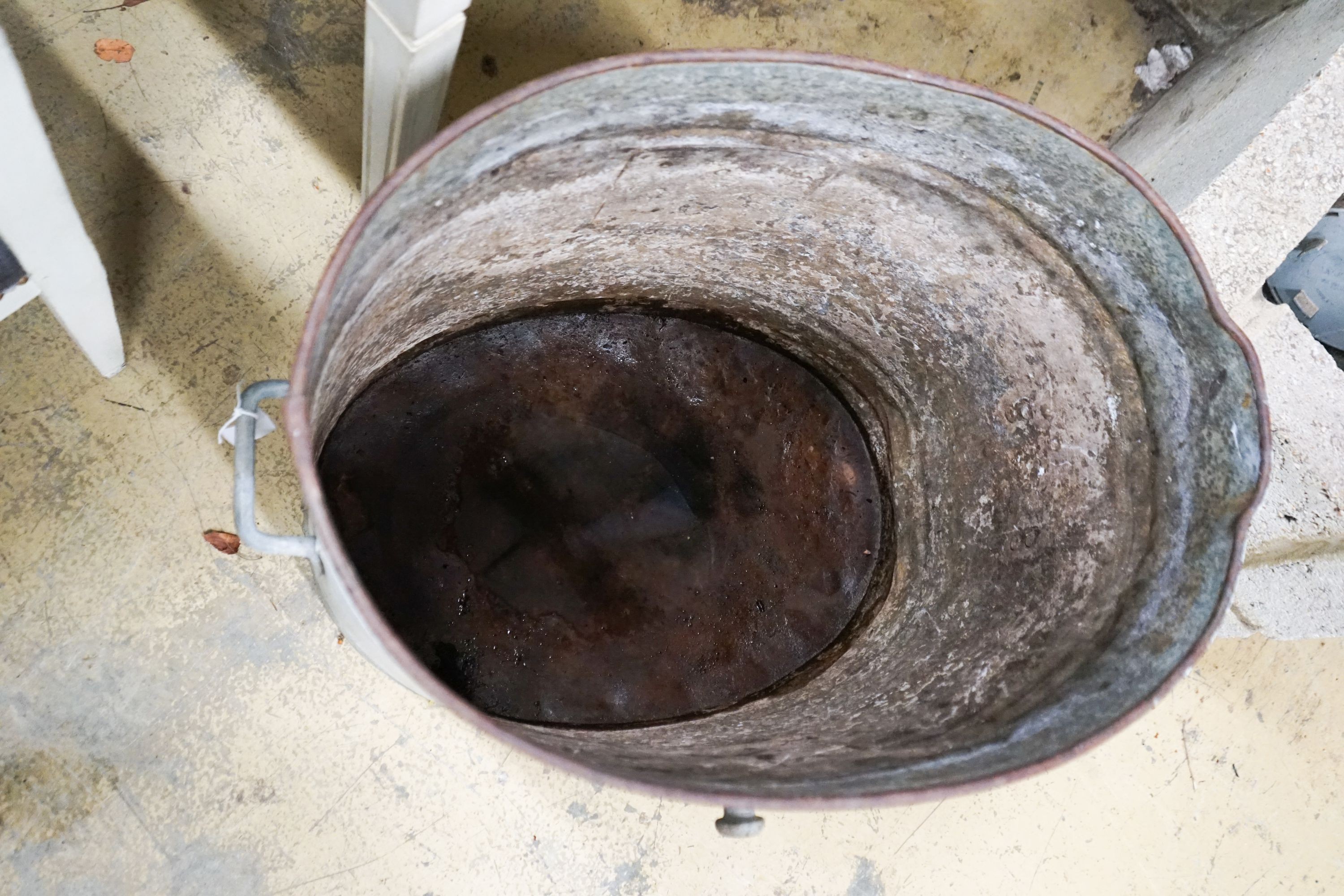 A galvanised metal tub, width 66cm height 60cm